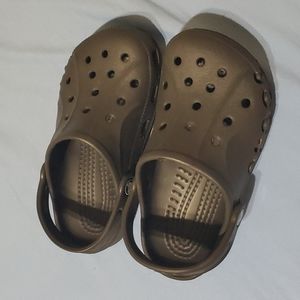 Size 13 kids black Crocs. Like new no wear. Pet and smoke free home.